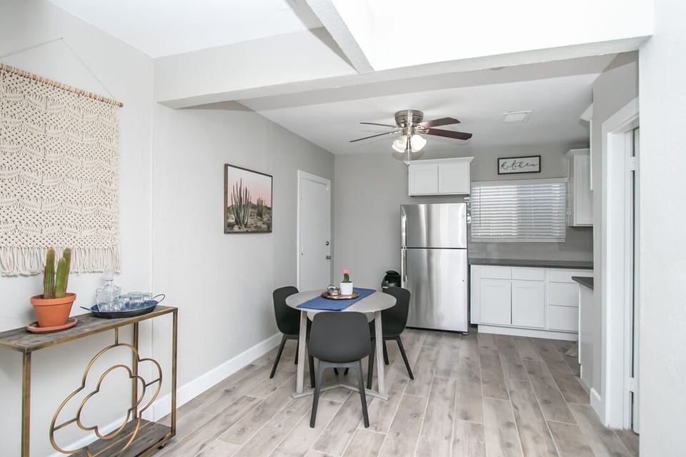 Dining room with full size refrigerator for them LONG stays . 