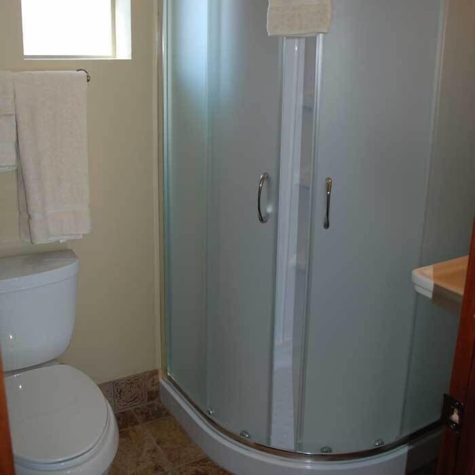 Standard Room, Multiple Beds | Bathroom | Free toiletries, hair dryer, towels