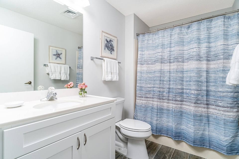 Guest Bedroom Bathroom with Tub and Shower Combo