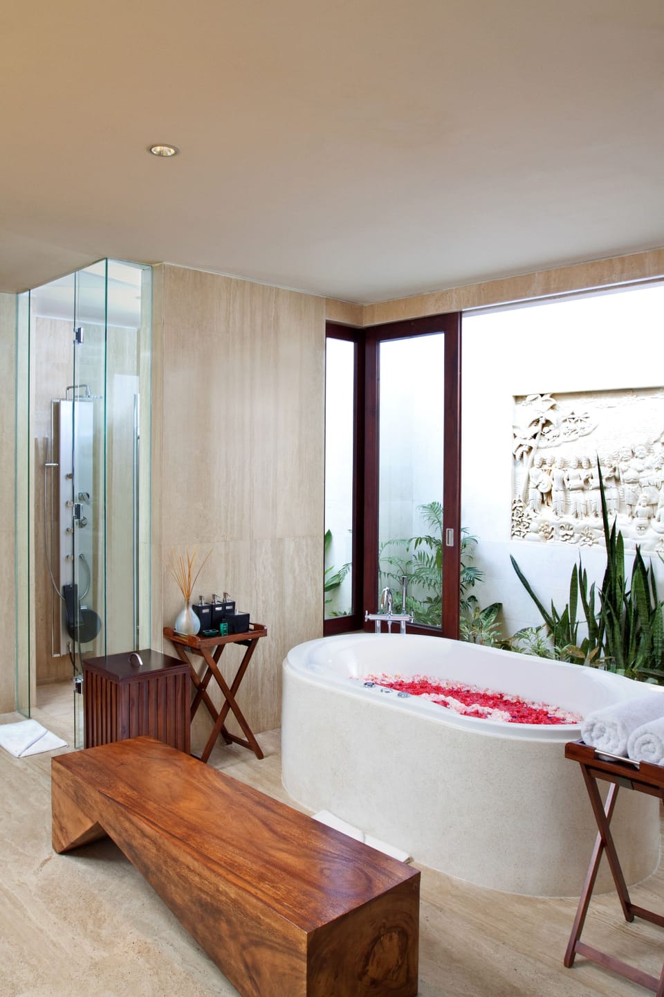 Separate tub and shower, rainfall showerhead, designer toiletries