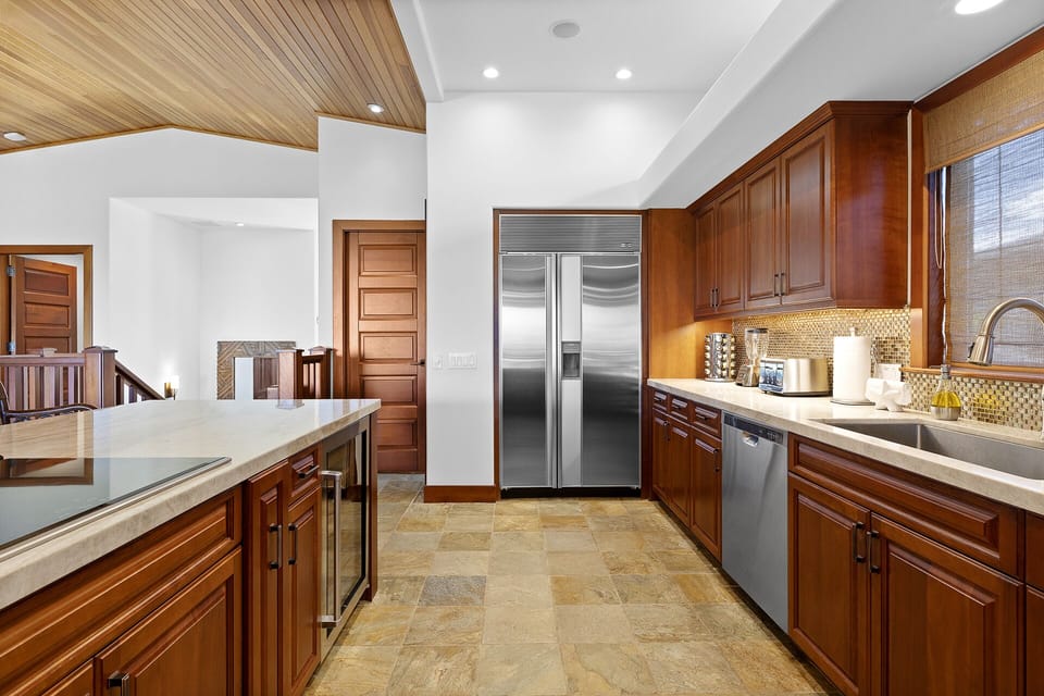 Gourmet kitchen with Wolf induction cooktop, Subzero refrigerator 