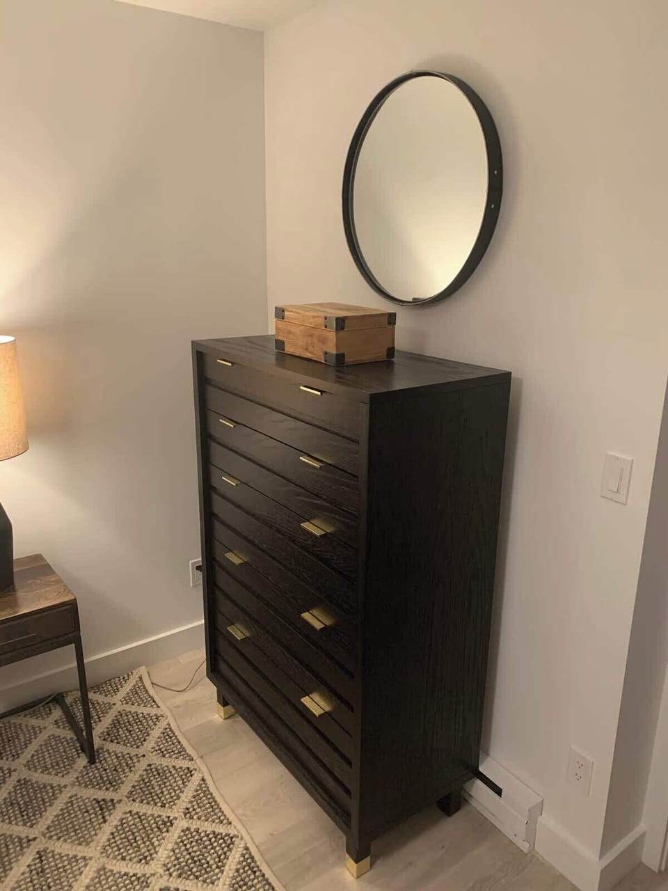 Full sized dresser in bedroom.