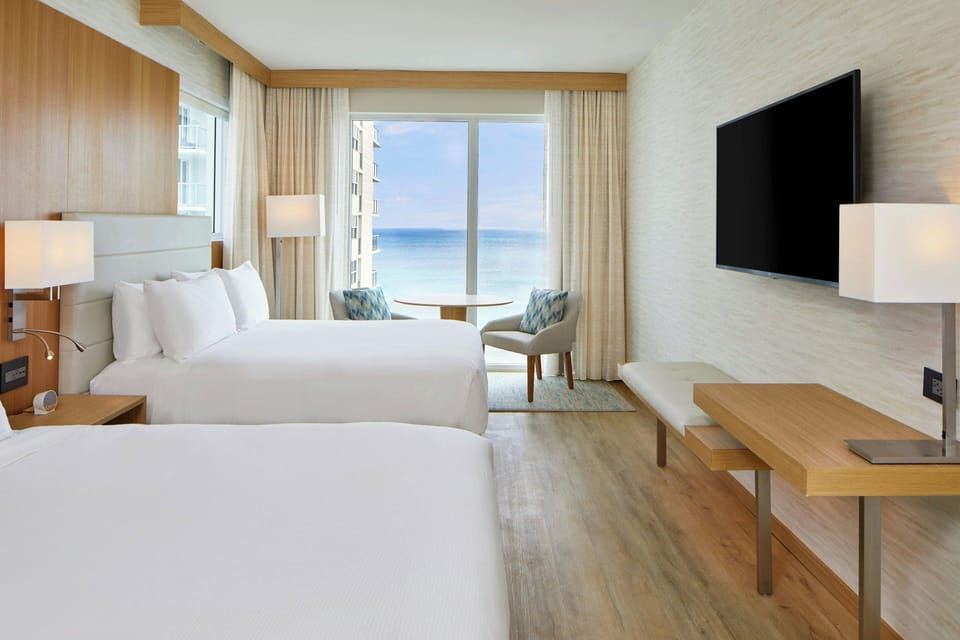 Premium bedding, down comforters, pillowtop beds, in-room safe