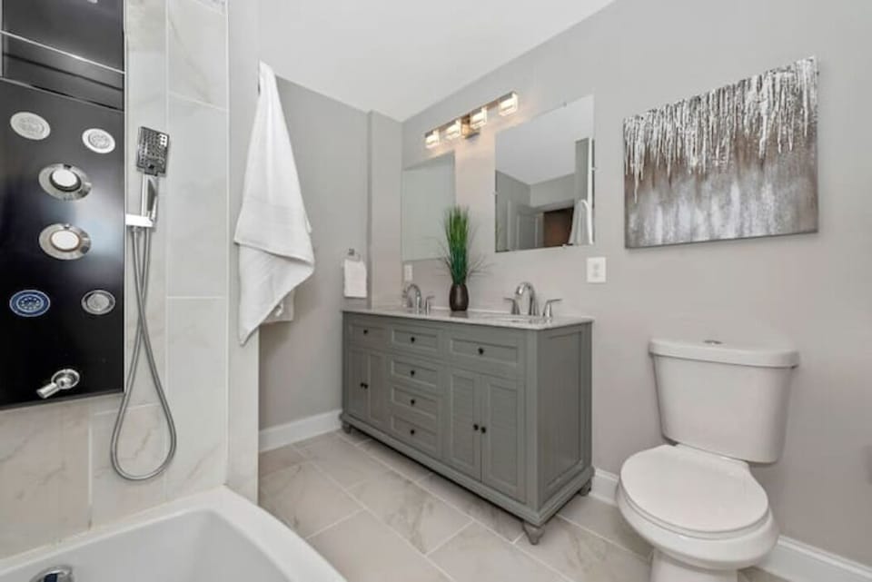 BATHROOM 2 - Full bathroom, bathtub, and amazing shower, also dual sinks
