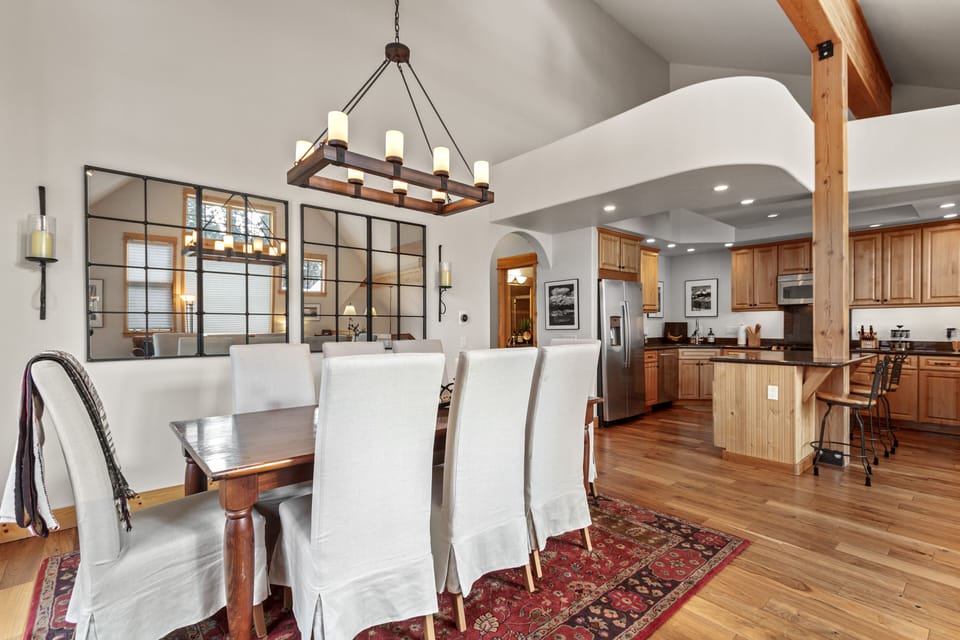 Dining and Kitchen view with shared bathroom upstairs.