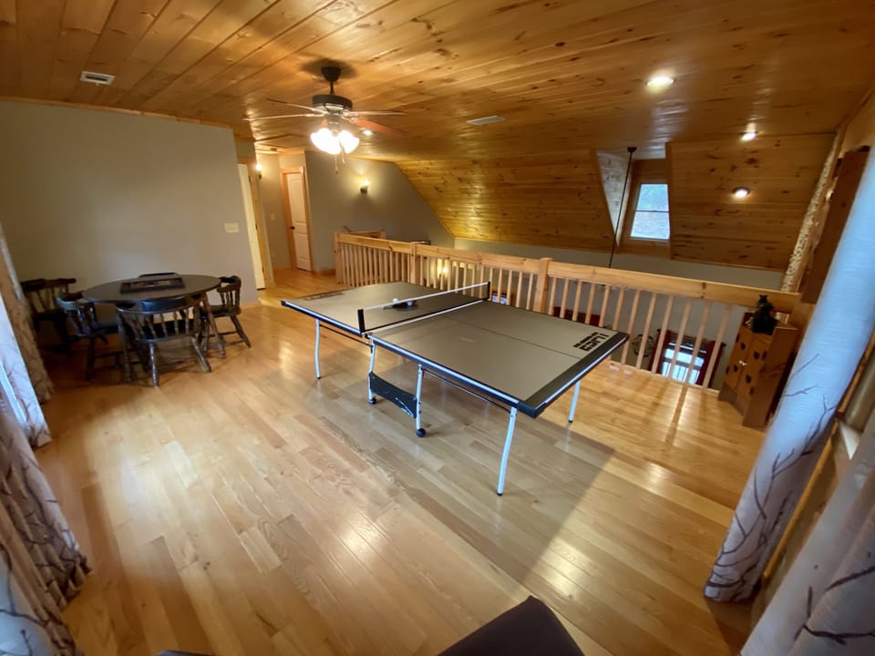 Loft includes: ping pong table, card table, stools to view all the fun!