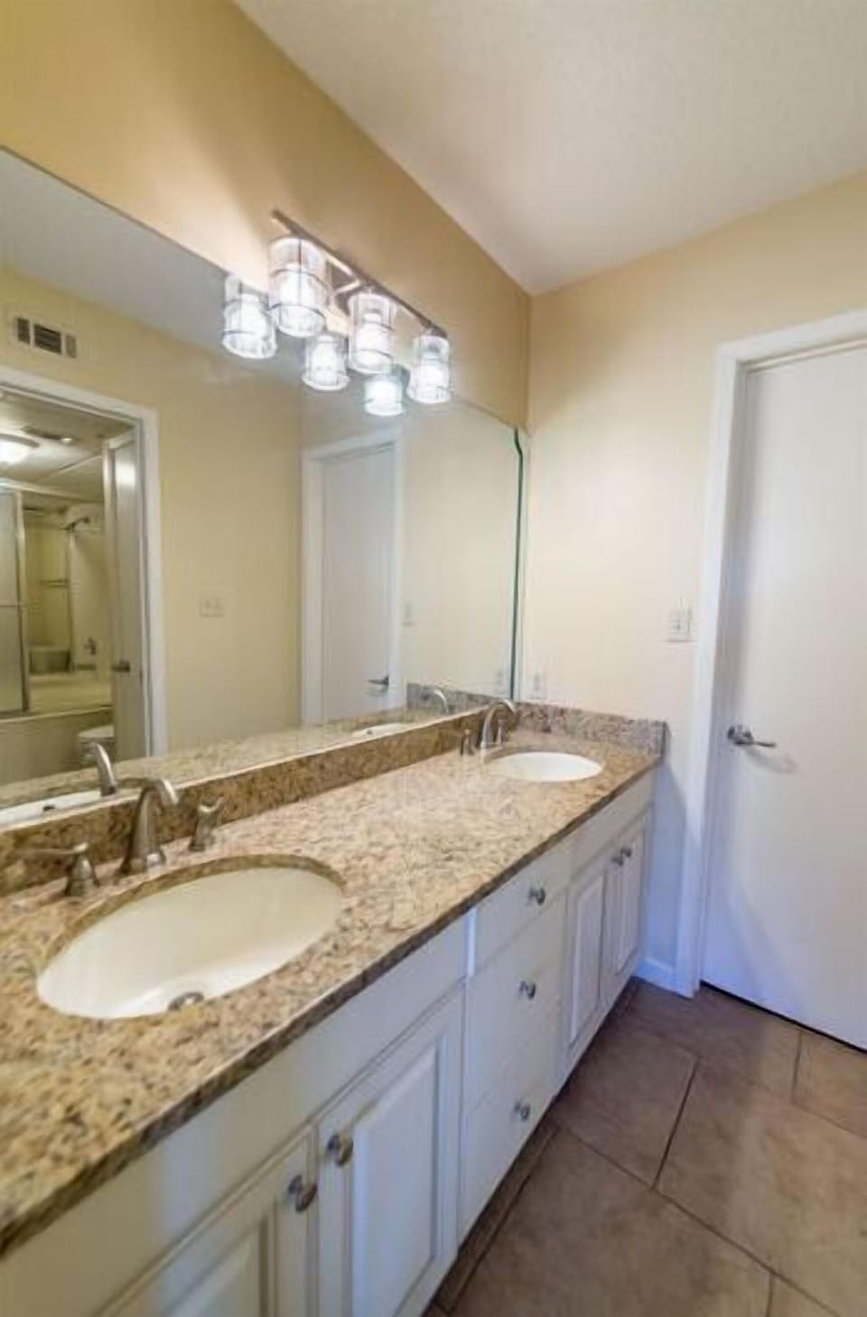Beautiful granite and high end cabinetry. The main bath has a large walk-in closet as well