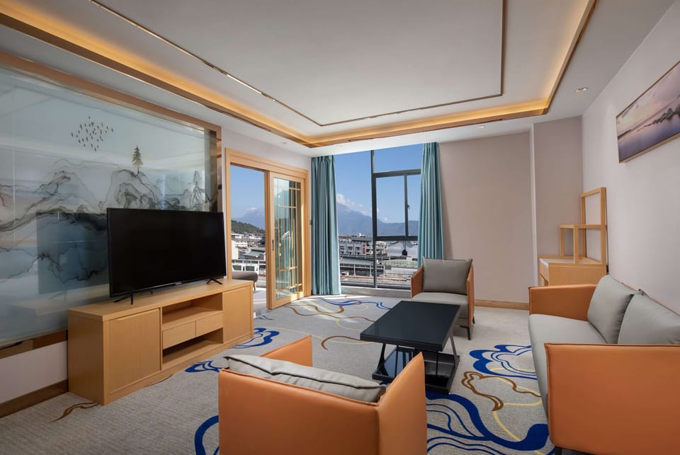 Minibar, iron/ironing board, WiFi (free), bed sheets