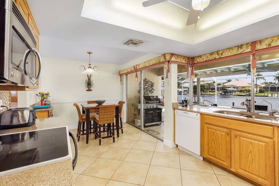 Kitchen with slider to lanai & pool