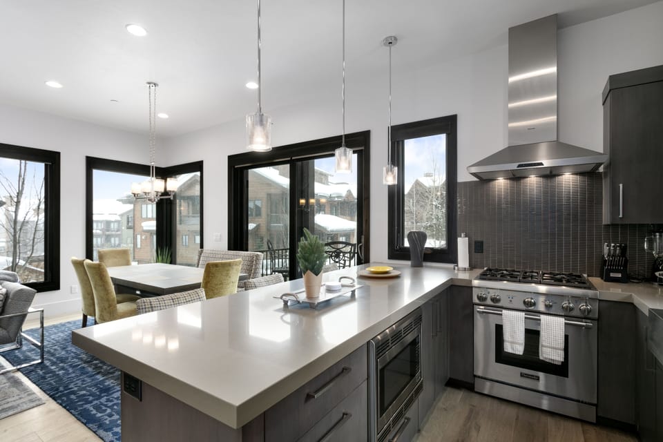 Luxury Condo | Private kitchen | Full-size fridge, microwave, oven, stovetop