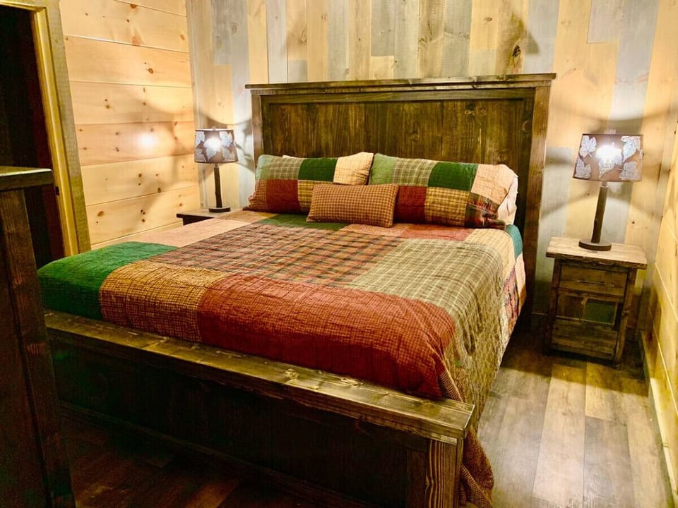 The lower level king bedroom. All bedrooms have their own full bathroom.