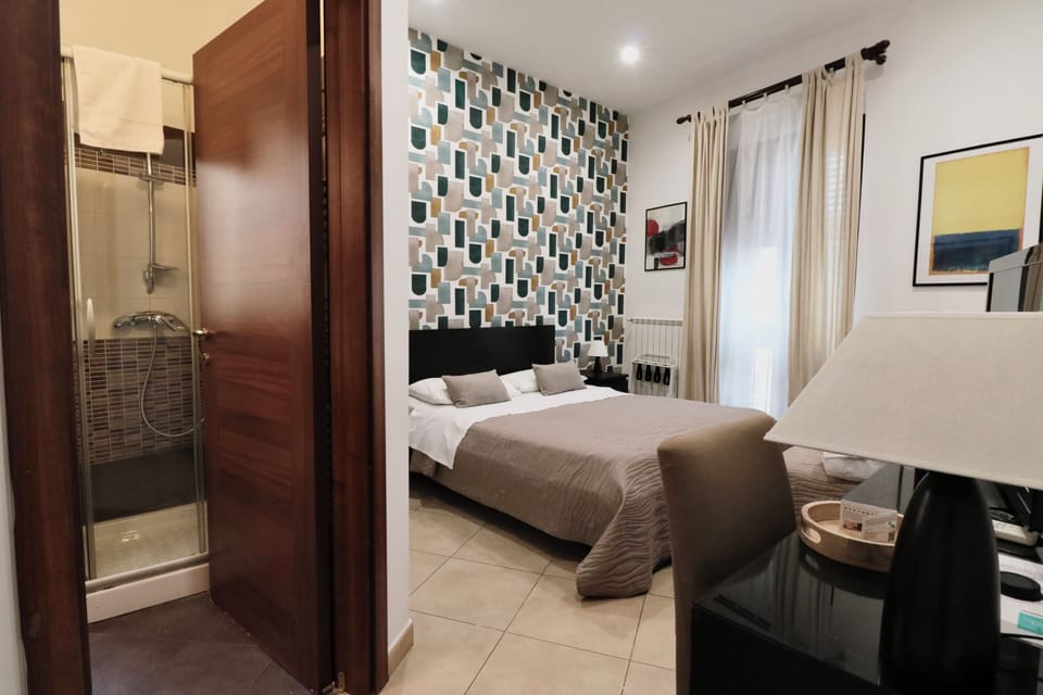 Deluxe Double Room, 1 Double Bed | Minibar, in-room safe, desk, blackout drapes