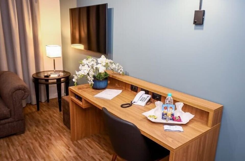 Superior Suite, 1 Double Bed | Living area | Flat-screen TV