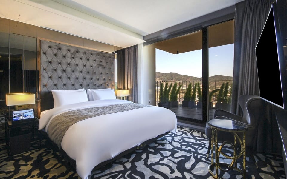 Premium bedding, memory foam beds, blackout drapes, free WiFi