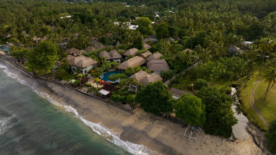 Private beach, white sand, sun loungers, beach umbrellas