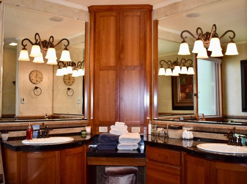 The spacious master bathroom boasts dual vanities.