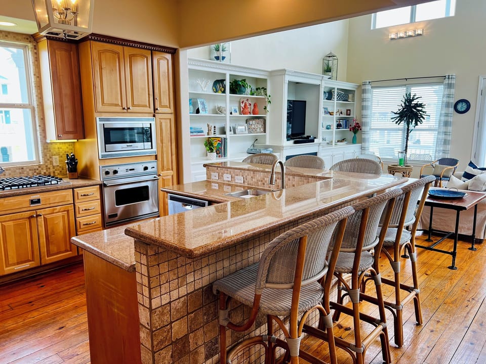 Frontgate wicker barstools provide seating for 6 while you are making drinks!