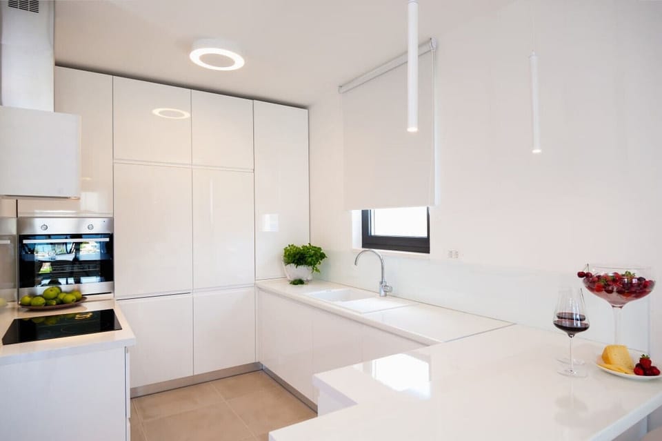 Interior of the modern kitchen on the ground floor of the Croatia luxury villa Trogir 2 for family vacation on Ciovo
