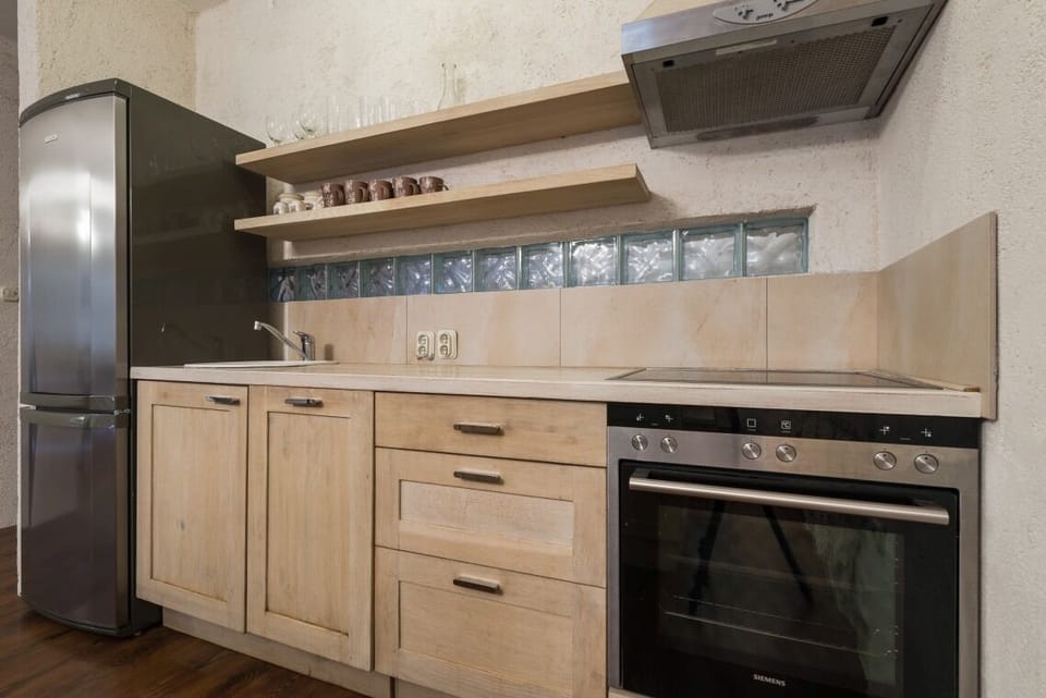 Fully-equipped kitchen in beachfront luxury villa on Brač with pool for vacation and rent.