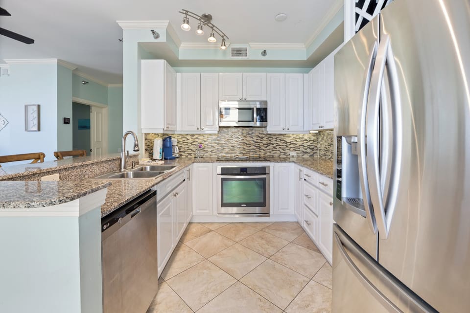 Seaside Sanctuary: Beach Colony's Beachfront Condo Invites T