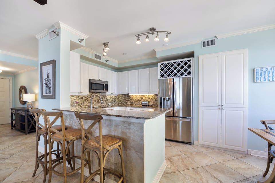 Seaside Sanctuary: Beach Colony's Beachfront Condo Invites T