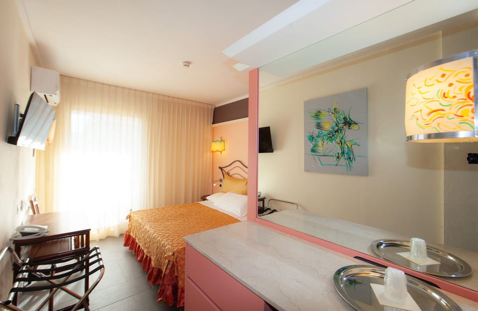 Standard Double or Twin Room | Minibar, in-room safe, desk, laptop workspace