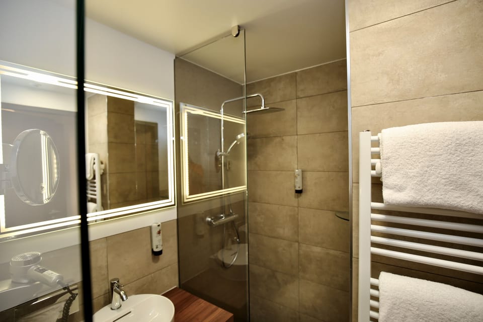 Shower, free toiletries, hair dryer, bathrobes