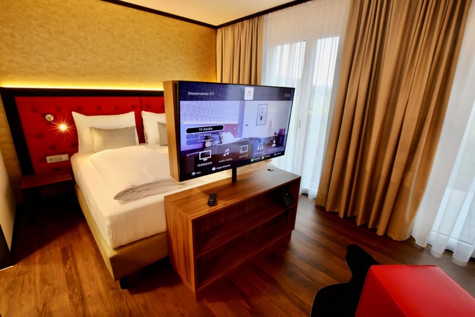 Hypo-allergenic bedding, minibar, in-room safe, laptop workspace