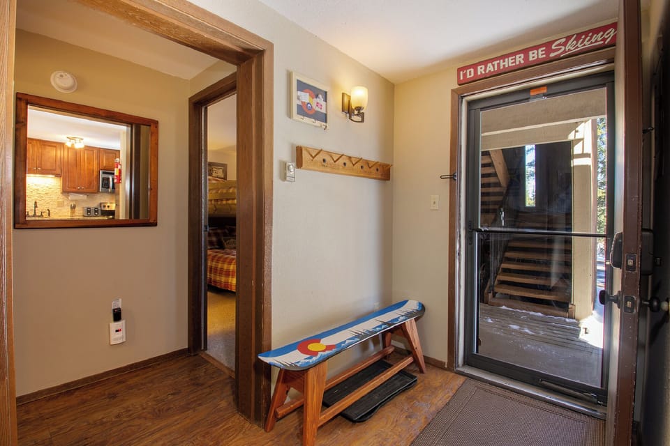Step into your cozy ski lodge retreat where warm wood accents and mountain charm welcome you home after adventure-filled days.