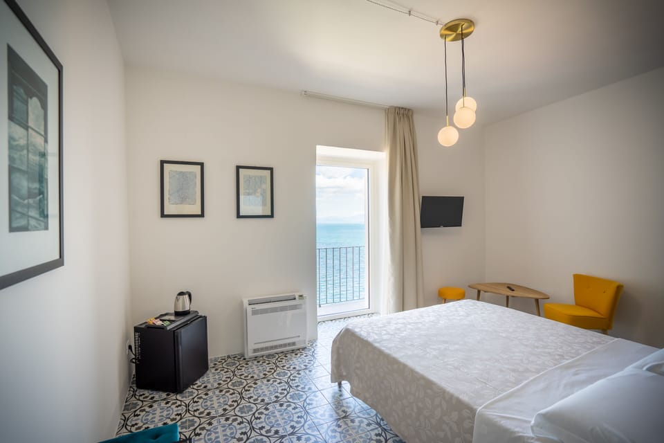 Superior Room, 1 Bedroom, Balcony, Sea View | Minibar, individually decorated, individually furnished, soundproofing