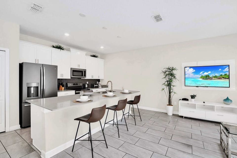 Fully Equipped Kitchen With Spacious Island Seating
