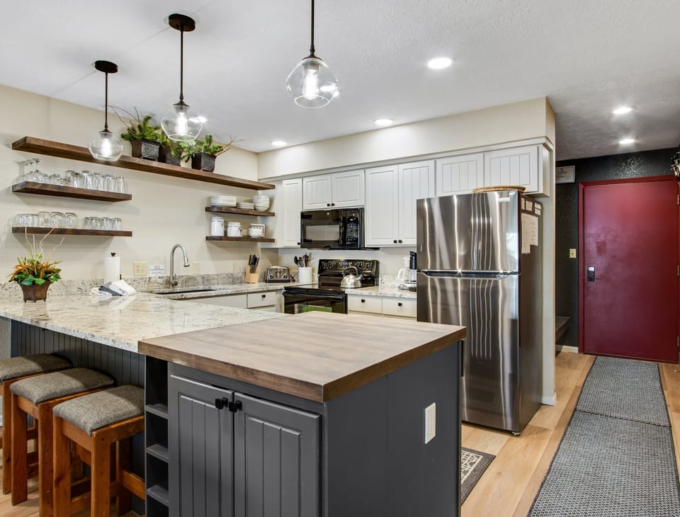 Counter Seating Plus Induction Stove, Spices, Toaster, drip coffee maker, Keurig