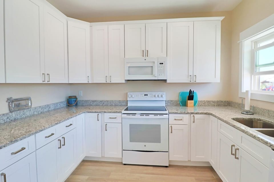 The kitchen is equipped for preparation of a family dinner or a simple bite for lunch.