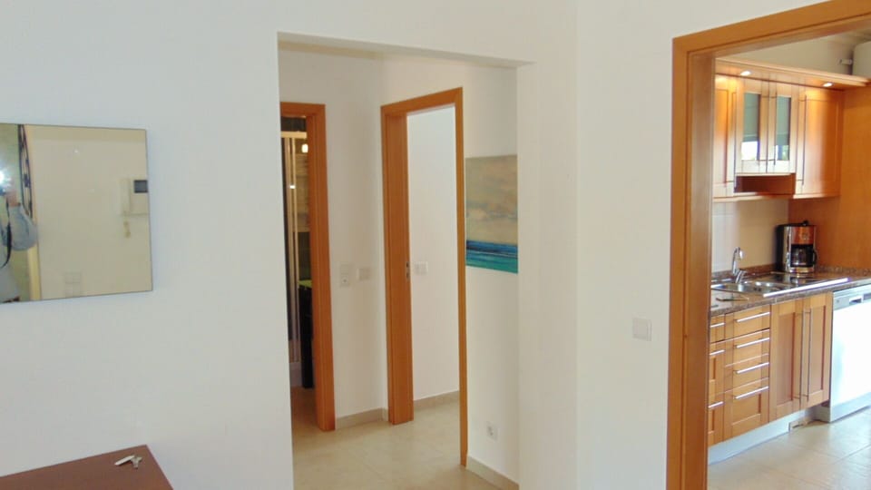 corridor linking Master bedroom and living room/dining room.
