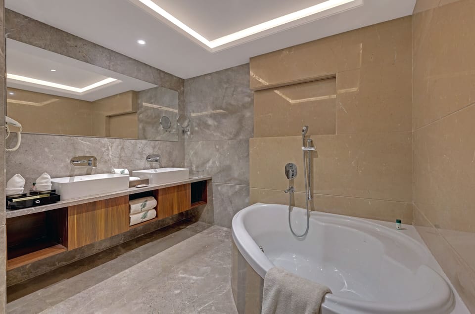 Fern Club Suite | Bathroom | Eco-friendly toiletries, hair dryer, bathrobes, slippers