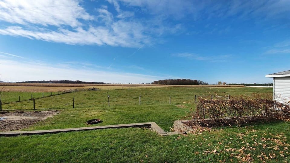 Country Living at its finest! During certain periods of the year, there will be cows grazing the field directly behind house! 