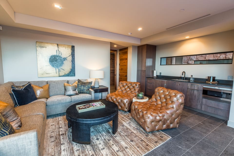 Downstairs Lounge- with pull out double bed. Private Patio. Kitchenette