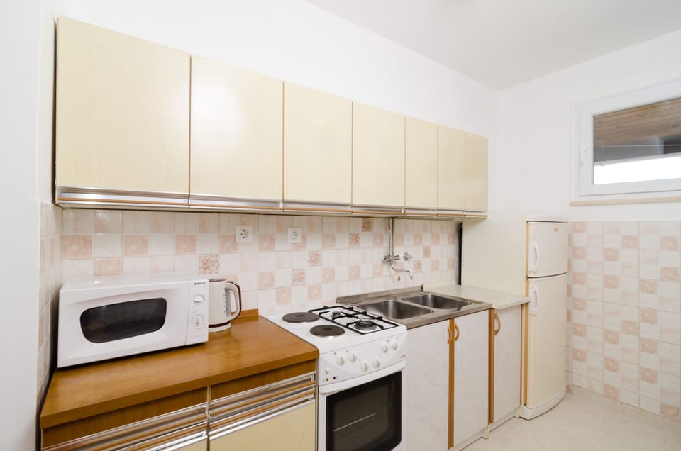 Apartment (Two Bedroom Apartment) | Private kitchen | Fridge