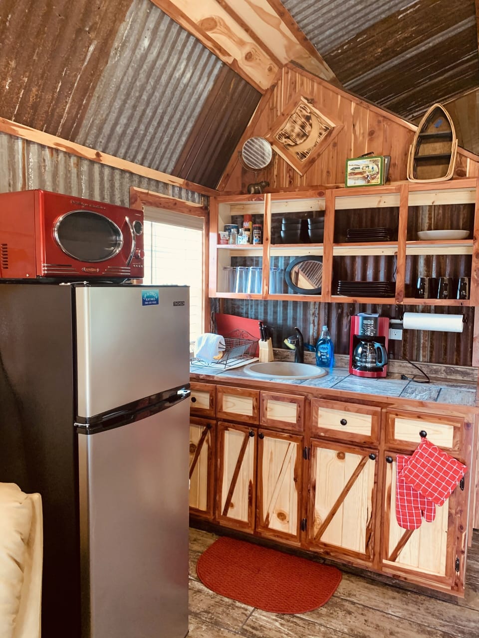 Kitchenette with Refrigerator, microwave and coffee pot