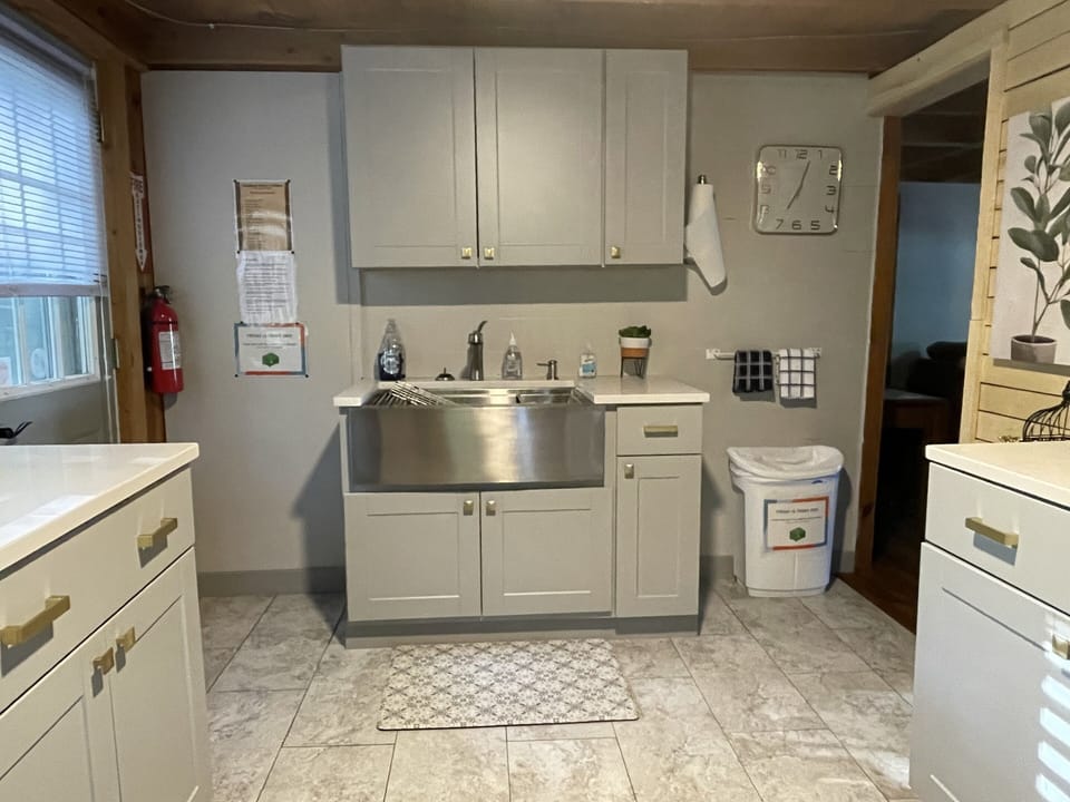 Large stainless steel farm sink. 