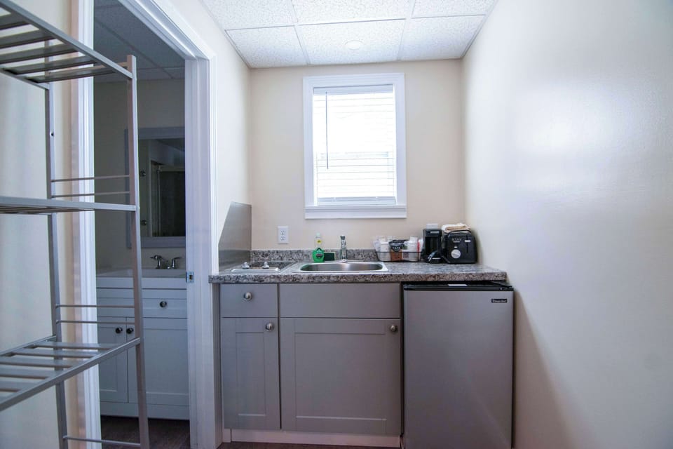 Mini-fridge, microwave, coffee/tea maker, toaster