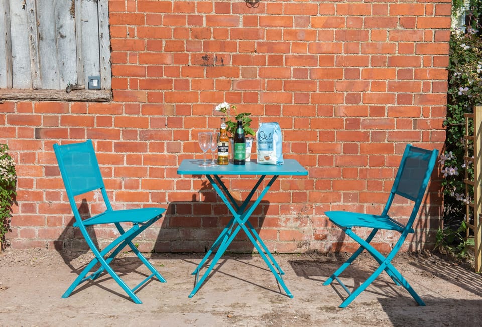 Terrace with bistro style table and chairs
