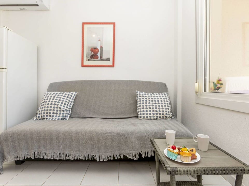 Furniture, Interior Design, Couch, Floor, Flooring, Textile, Room, Living Room, Apartment, Home