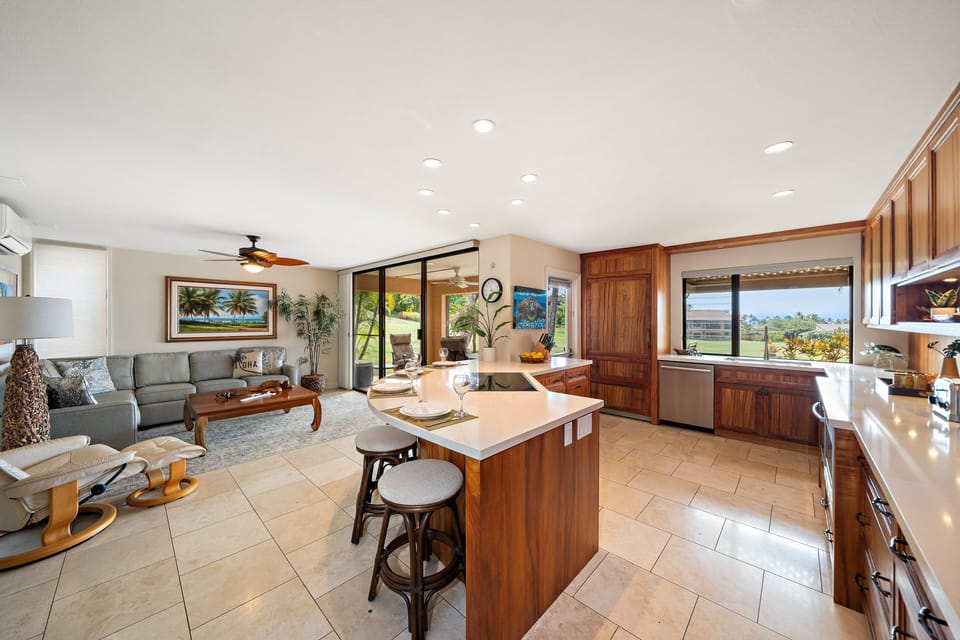 Admire spacious designs framed by glass doors and greenery.