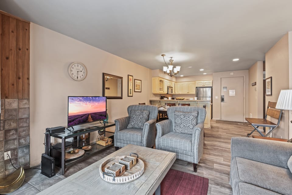 Premier Snow Flower Condominium 107's living room with flat screen TV.