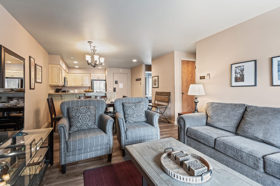 Premier Snow Flower Condominium 107's spacious living room seating.