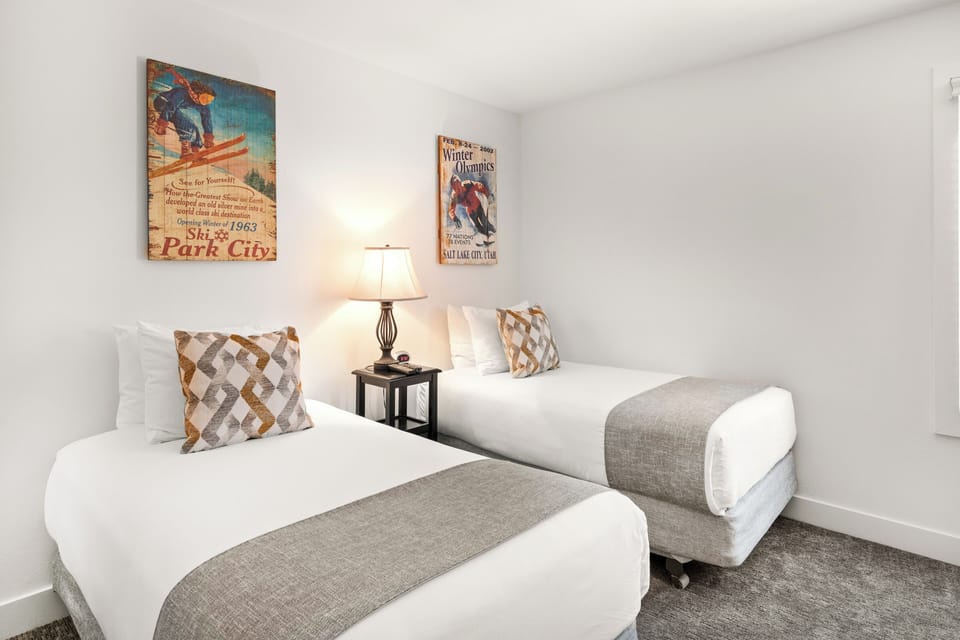 The second bedroom has two twin beds.