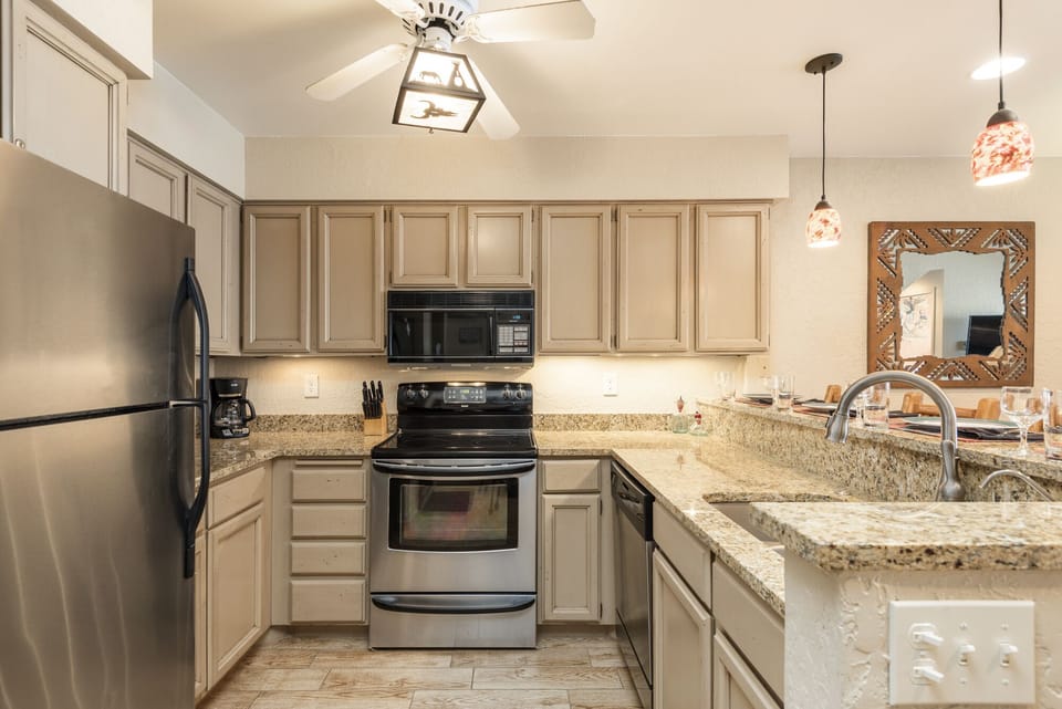 Fully equipped kitchen with stainless steel appliances