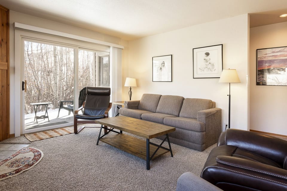 Living room with private patio 