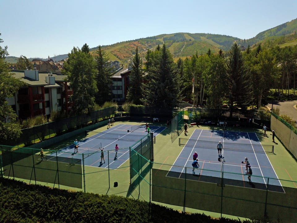 Tennis and pickleball courts at Snow Flower Condominiums, open in the summer only.